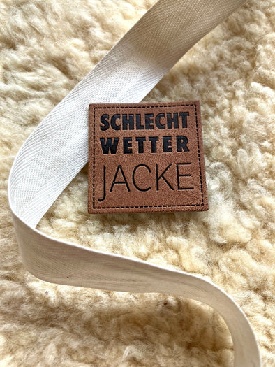 Kunstlederlabel "Schlechtwetterjacke"